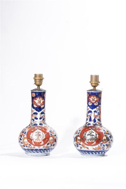 null Chine XXe
Paire vases en porcelaine montés en lampe.
(Accidents et restaura...