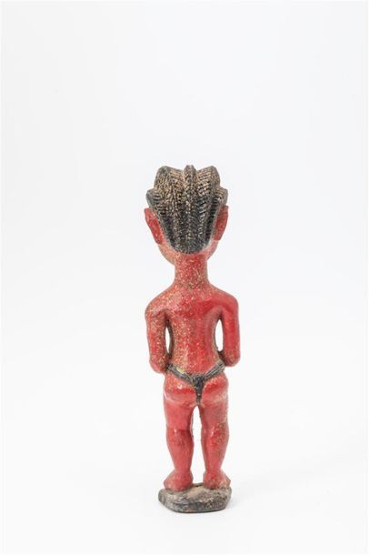 null COTE D'IVOIRE, Culture Baoulé. 
Statuette en bois à patine rouge représentant...