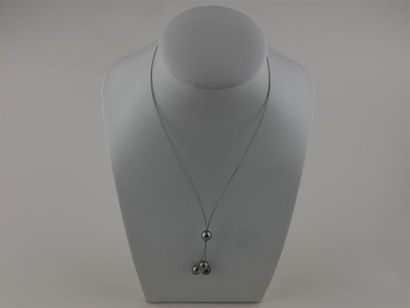 null PERLES de TAHITI 
Collier de quatre perles sur câble 
Diam. perle : 8.4mm
Long....