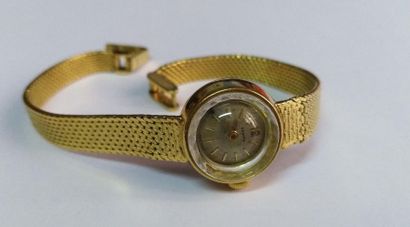 null ZENITH 
une montre bracelet de dame. 
Boîtier et bracelet en or 750/1000
Poids...