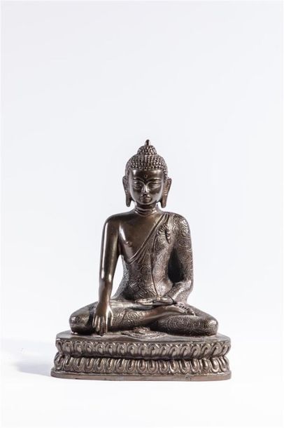  CHINE XXème siècle Boddhisattva en méditation en bronze à patine brune Traces de...