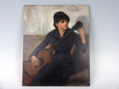 Ecole du XXème siècle Jeune femme à la guitare. Huile sur panneau. Porte une inscription...