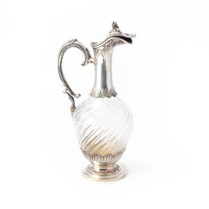 AIGUIÈRE Glass ewer with twisted decoration in a silver frame carved with foliage...