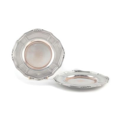 BOIN TABURET BOIN TABURET A
pair of round silver and vermeil dishes with a moving...