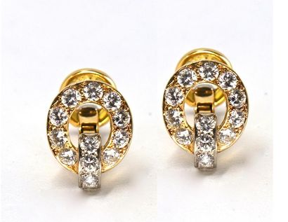 PAIRE DE BOUTONS DE MANCHETTE Pair of ring-shaped cufflinks in 18K yellow and white...