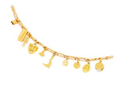 Bracelet Bracelet en or jaune à maillons orné de 10 breloques en or
Poids : 20,6...