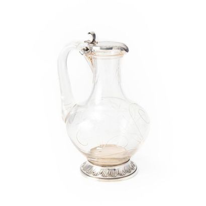 AIGUIÈRE Glass ewer with engraved decoration in a silver
M.O. rocaille setting: P.C...