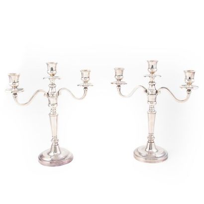 null Pair of silver metal torches with two arms and three lights. 18th
century style...