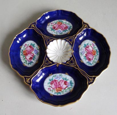 LIMOGES LIMOGES - France
Porcelain bowl with four compartments, decorated with polychrome...