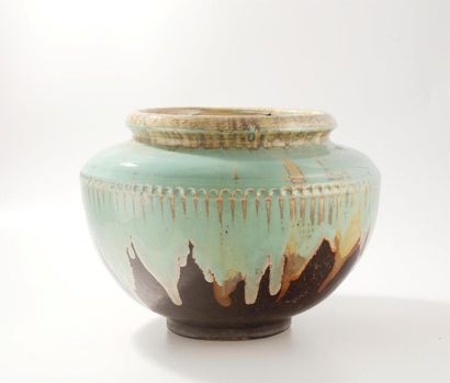 null Large ovoid shaped planter with narrow neck in green glazed ceramic and brown
flamed...