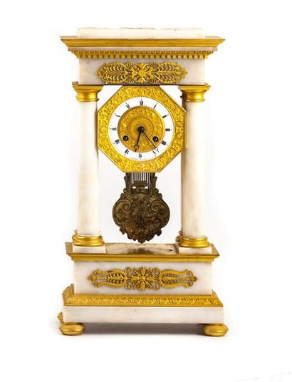 null White marble and gilt bronze portico clock with four columns framing the octagonal...