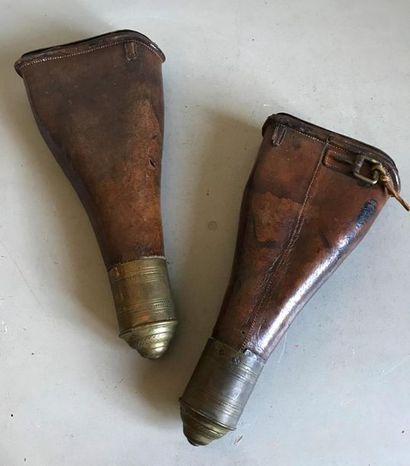 null Pair of leather and brass saddle cases for pistol (?). XIXth
H. 30 cm