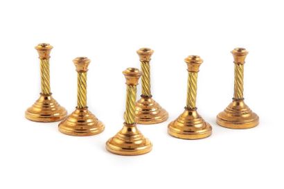 null Set of 6 small gold-plated metal doll picks.