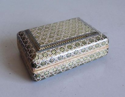 null Wooden cigarette box decorated with golden stars in imitation of watermarks.
Oriental...