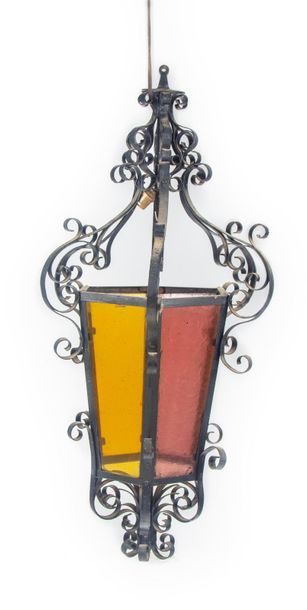 null Large wrought iron lantern with cut-off sides.
H. 80 cm