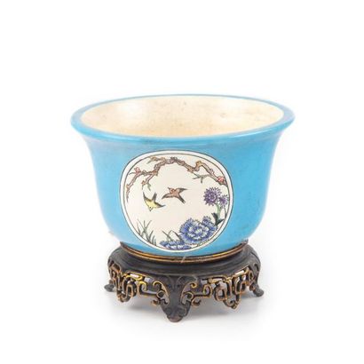 null Small earthenware cup decorated in the taste of China with birds and leaves...