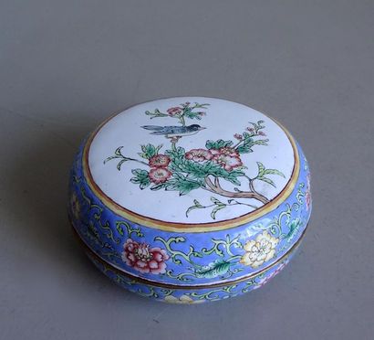 null CHINA
Round shaped covered metal box with enamelled decoration of a bird connected...