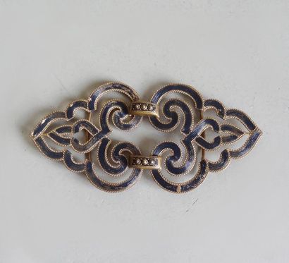 null Elegant belt buckle in openwork metal forming an orinetal arabesque pattern.
L.:...