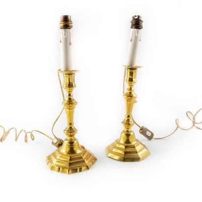 null Two metal candleholders with golden patina and turned shaft in baluster
Louis...