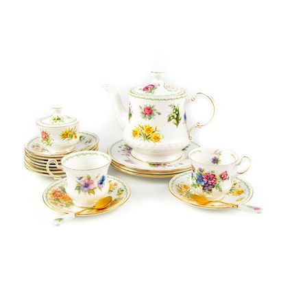 null English manufacture (ROYALE ALBERT?) Porcelain tea service
part with flower...
