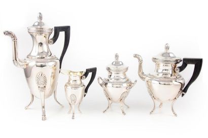 null Tea and coffee set in silver plated metal chiselled with friezes of water leaves....