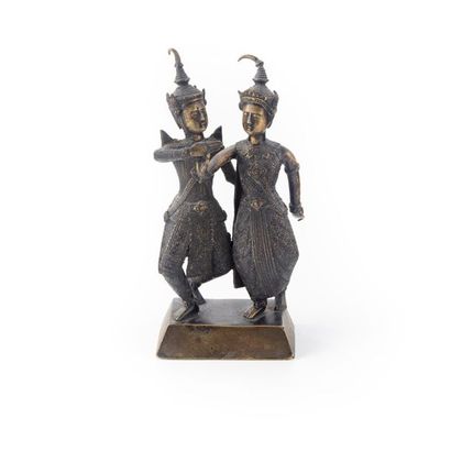 null LAOS ou THAILANDE.
Couple princier dansant en bronze patiné.
H. : 19 cm.