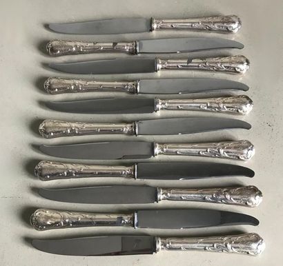 null Maison CHRISTOFLE 
Suite of eleven steel blade table knives on a silver plated...