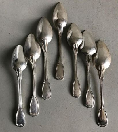 null Set of seven small silver spoons (mismatched) model with nets and contours....