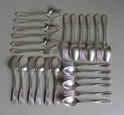 null Twelve silver cutlery dishes chiselled with Rocaille foliage on stem and spatula....