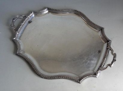 null Large oval silver metal service tray with a moving edge molded and chiselled...