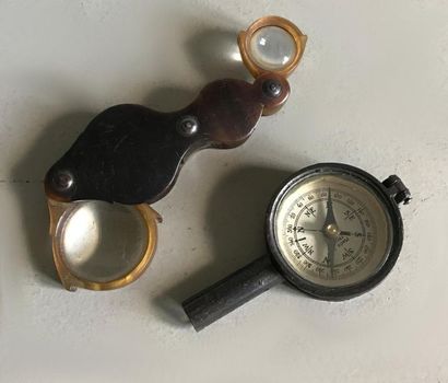 null A compass and a double magnifying glass in blond horn. Late 19th century