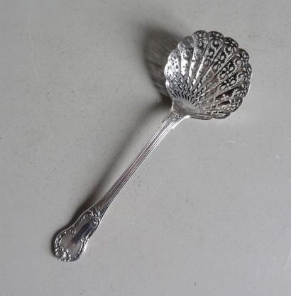 null Nice silver sugar spoon. The spoon in the shape of a shell pierced with floral...