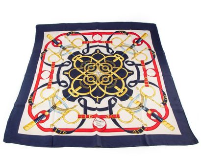 null HERMES - PARIS 
Carré "Eperons d'or" Silk 
scarf. Signed H. d'ORIGNY
Stains...