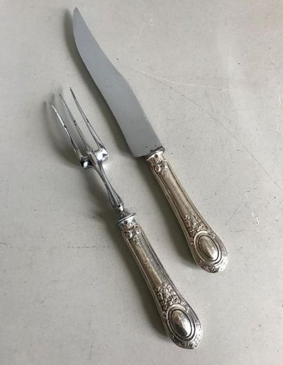 null Steel cutlery and silver handle with a chiselled silver filling in the Louis...