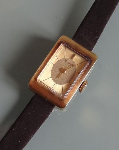 null BULOVA
Lady's watch with rectangular case in gilded metal. Gold case back with...