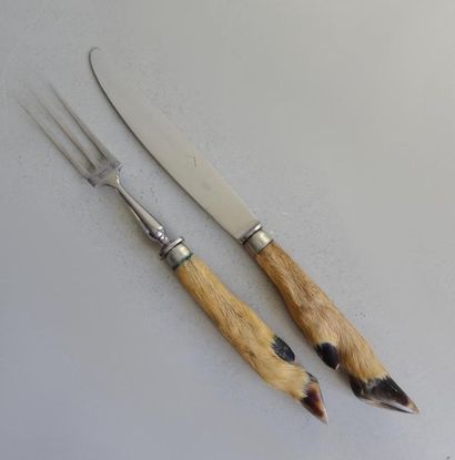 null Steel cutlery with deer leg handle.
L. 34 cm