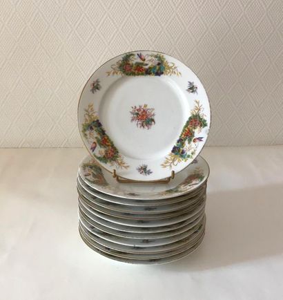 LIMOGES LIMOGES
Twelve porcelain dessert plates with floral decoration. Late 19th...