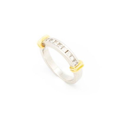 null Large platinum and gold wedding band decorated with small diamonds
Gross weight:...