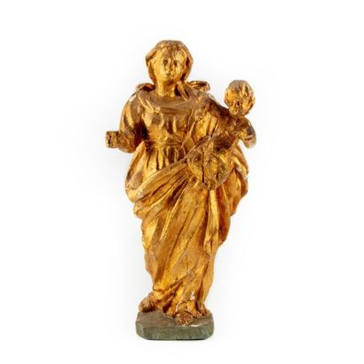 null Statuette de Vierge à l'Enfant en bois doré. XVIIIème
H: 31cm 
Accident à l'Enfant...