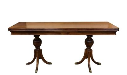 null Rectangular console table in mahogany and mahogany veneer. Flap top. It rests...