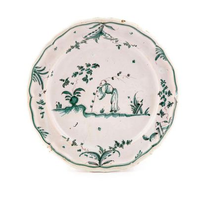 null SOUTH-WEST
Small round earthenware dish with contoured rim decorated in green...