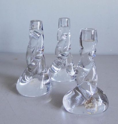 SÈVRES Cristallerie de SEVRES
Set of three twisted transparent crystal candleholders.
Signed...