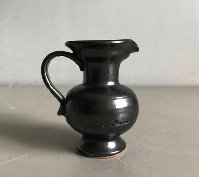 MARAIS Jean MARAIS
Small ceramic pitcher with black glossy enamel. 
Signed on the...