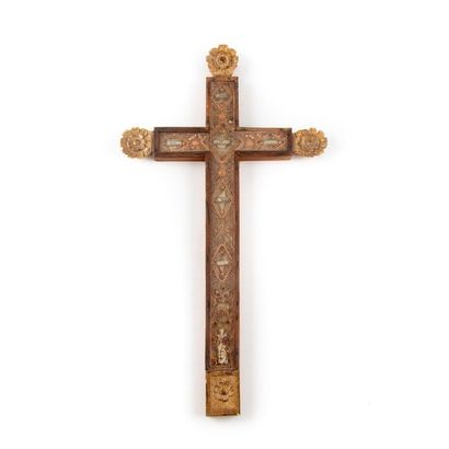 null Wooden reliquary cross finished with carved flowers forming a frame decorated...