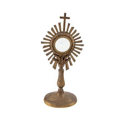 null Bronze sun monstrance, a moon made of rugged glass with a radiant decoration...