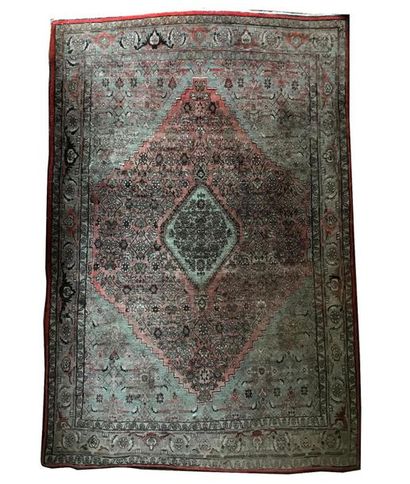 null Pretty little Persian carpet decorated with two crenellated medallions on a...