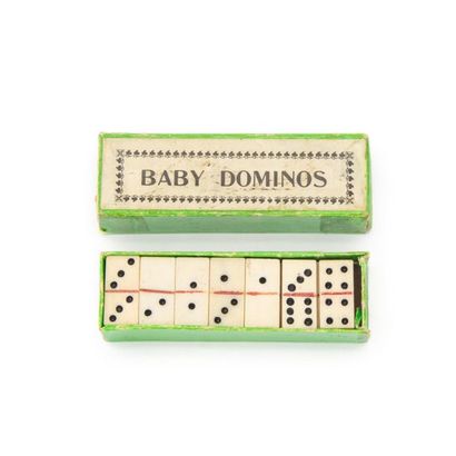 null Baby bone dominoes in a cardboard box.