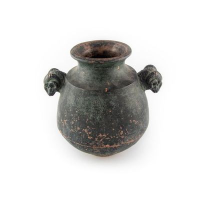 null In the taste of the Antique
Vase of ovoid shape in terra cotta with black slip....