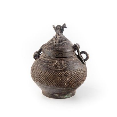 null KONDH, INDIA.
Medicine jar with lid decorated with a bronze cock from the Bastar...
