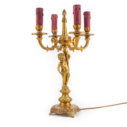 null Bronze 4-light lamp decorated with a putto
Raised with electricity
End of 19th
H.:...